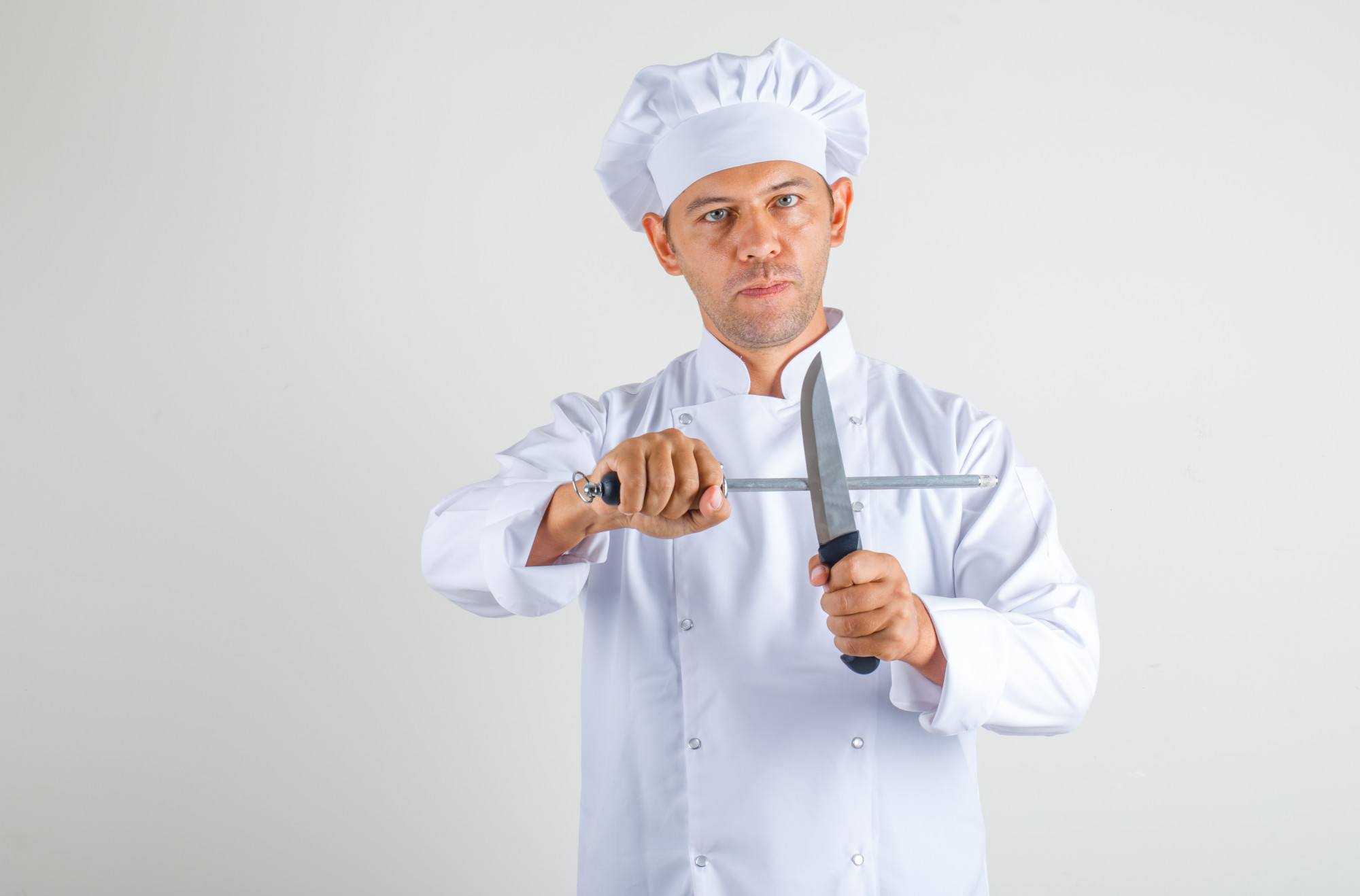 Teacher demonstrating knife technique via webcam